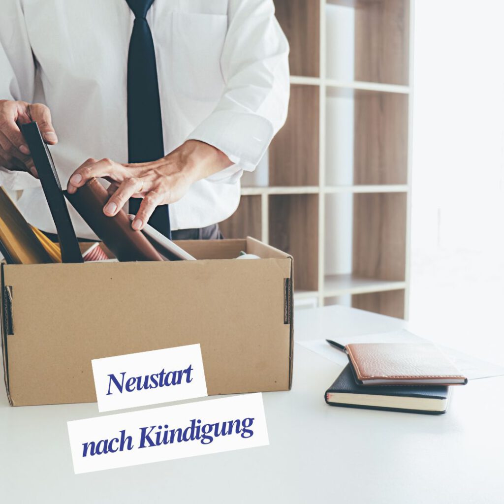 Person mit Umzugskarton nach dem Verlassen des Arbeitsplatzes